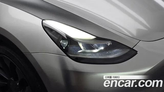 Tesla Model Y — Фото автомобиля 7