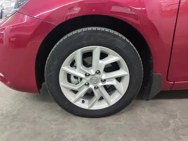 Nissan Tiida — Фото автомобиля 22