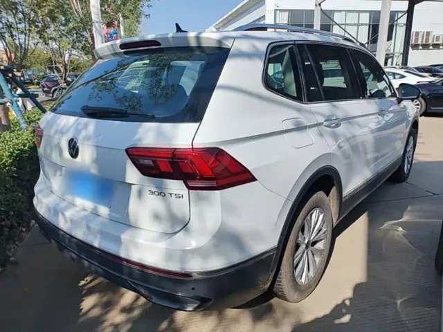Volkswagen Tiguan L — Фото автомобиля 6