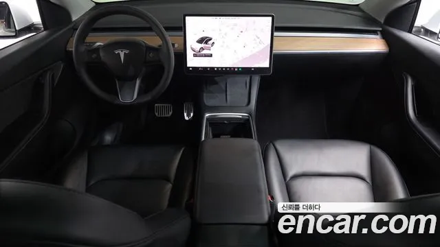 Tesla Model Y — Фото автомобиля 9