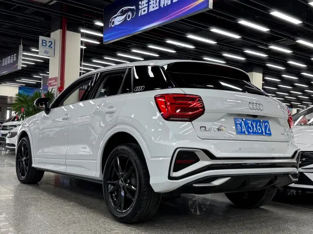Audi Q2L — Фото автомобиля 11