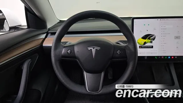 Tesla Model 3 — Фото автомобиля 12