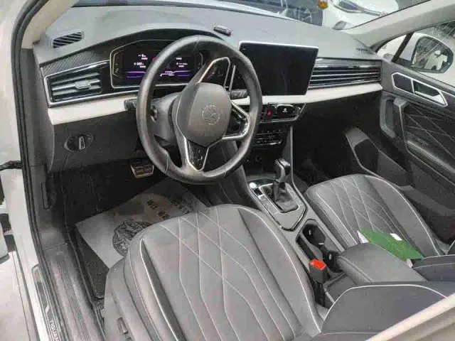 Volkswagen Tiguan L — Фото автомобиля 3