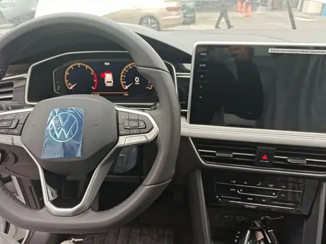 Volkswagen Tiguan L — Фото автомобиля 9