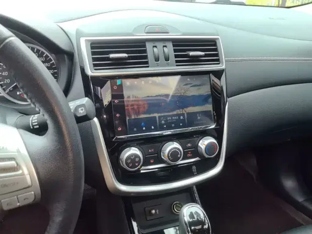 Nissan Tiida — Фото автомобиля 12