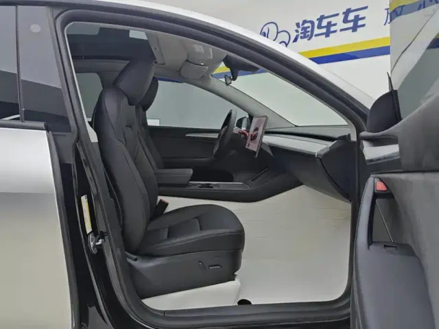 Tesla Model Y — Фото автомобиля 8