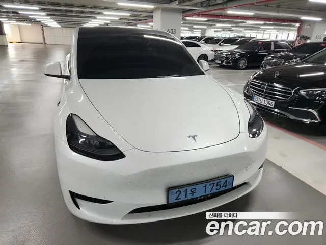 Tesla Model Y — Фото автомобиля 3