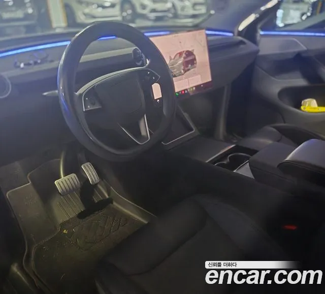 Tesla Model Y — Фото автомобиля 7