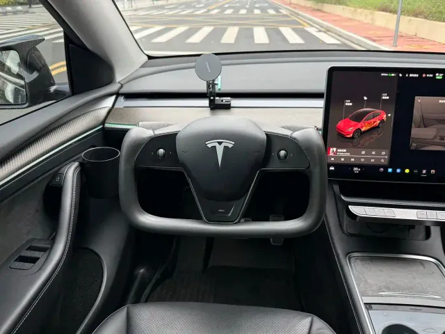 Tesla Model Y — Фото автомобиля 7