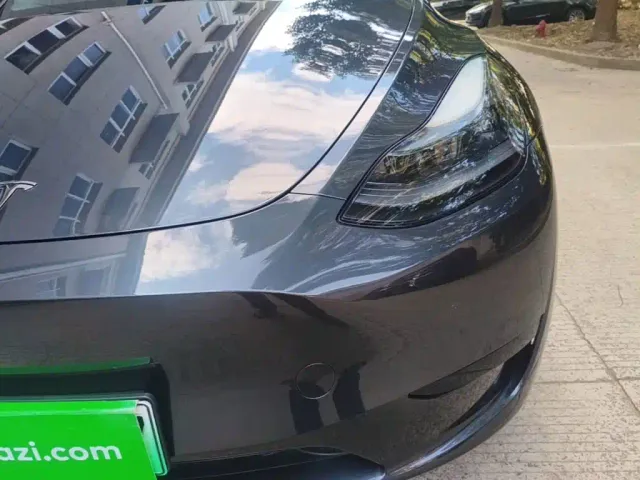 Tesla Model Y — Фото автомобиля 23