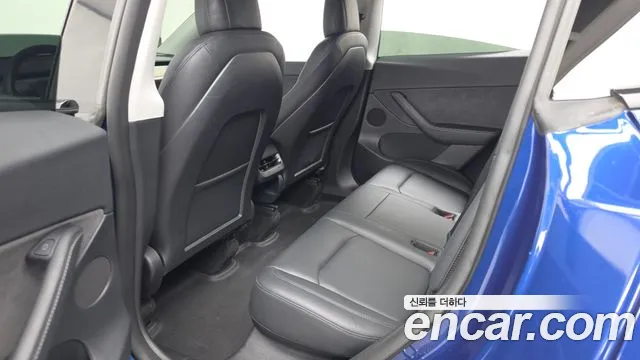 Tesla Model Y — Фото автомобиля 16