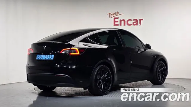 Tesla Model Y — Фото автомобиля 2