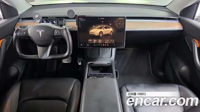 Tesla Model Y — Фото автомобиля 7