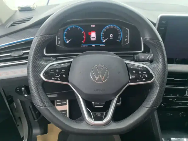 Volkswagen Tiguan L — Фото автомобиля 10