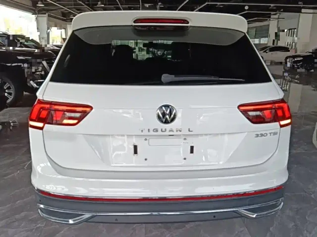 Volkswagen Tiguan L — Фото автомобиля 5