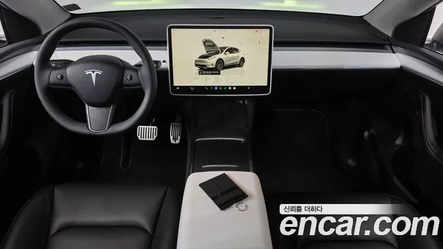 Tesla Model Y — Фото автомобиля 10