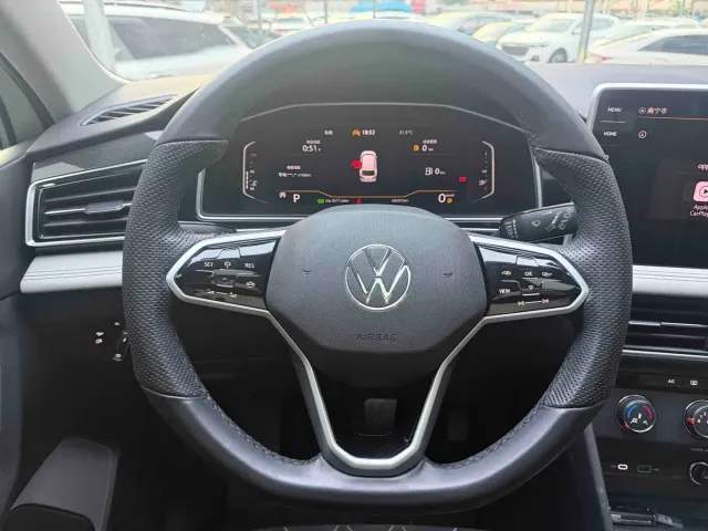 Volkswagen Tiguan L — Фото автомобиля 14