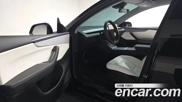 Tesla Model Y — Фото автомобиля 9