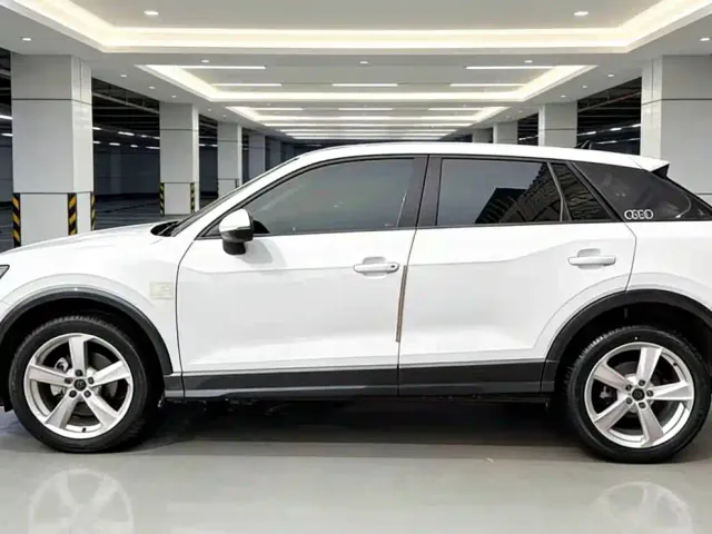 Audi Q2L — Фото автомобиля 5