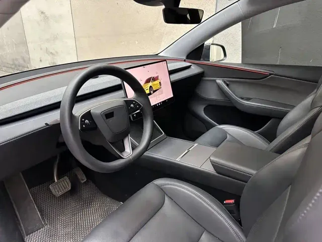 Tesla Model Y — Фото автомобиля 10