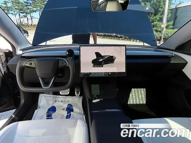 Tesla Model 3 — Фото автомобиля 7
