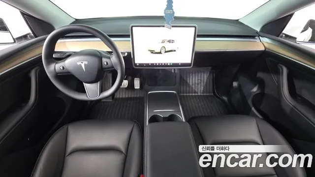Tesla Model Y — Фото автомобиля 10