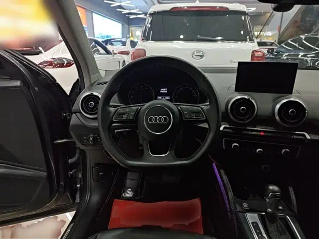 Audi Q2L — Фото автомобиля 10