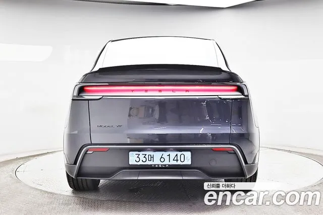 Tesla Model Y — Фото автомобиля 4