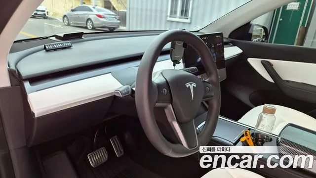 Tesla Model Y — Фото автомобиля 6