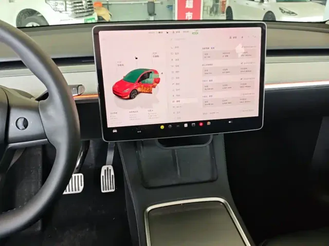 Tesla Model Y — Фото автомобиля 12
