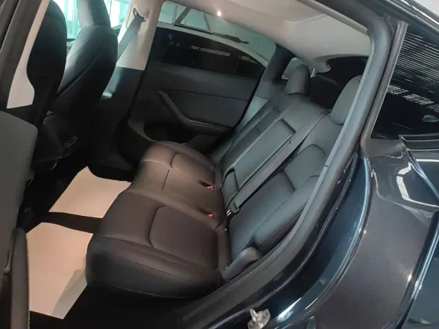 Tesla Model Y — Фото автомобиля 16