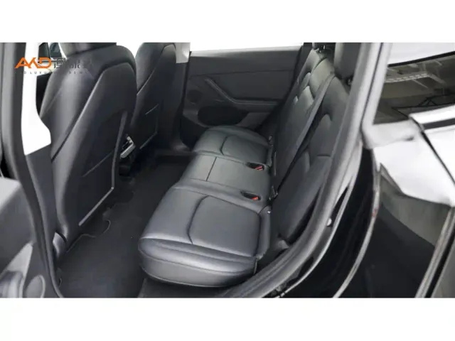 Tesla Model Y — Фото автомобиля 7