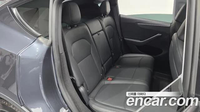 Tesla Model Y — Фото автомобиля 7