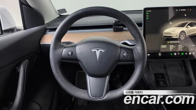 Tesla Model Y — Фото автомобиля 18