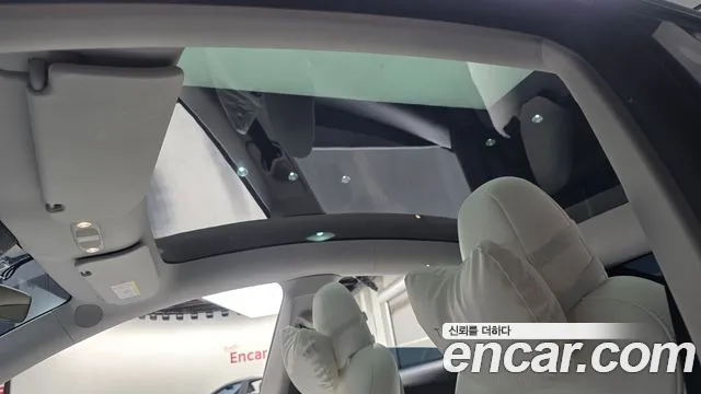 Tesla Model Y — Фото автомобиля 22