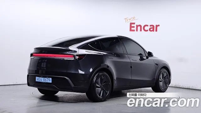 Tesla Model Y — Фото автомобиля 2