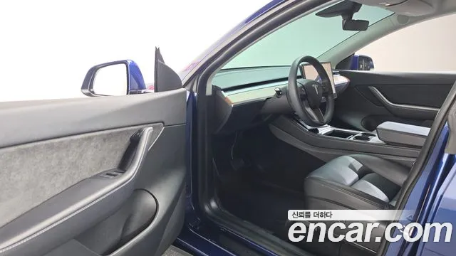 Tesla Model Y — Фото автомобиля 15