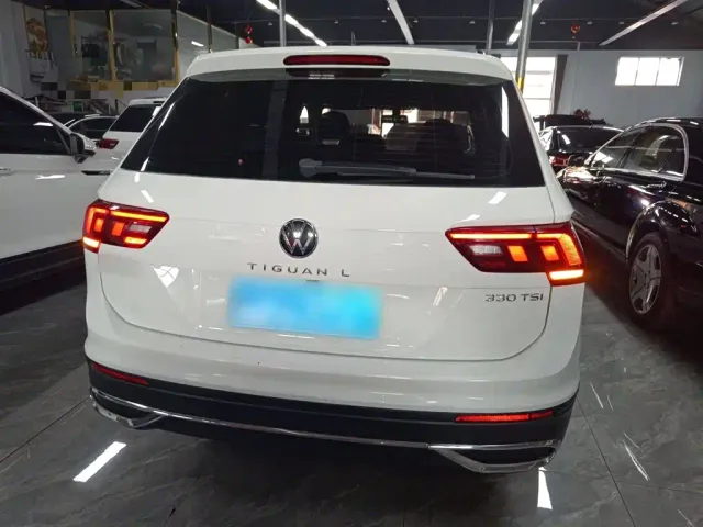 Volkswagen Tiguan L — Фото автомобиля 4