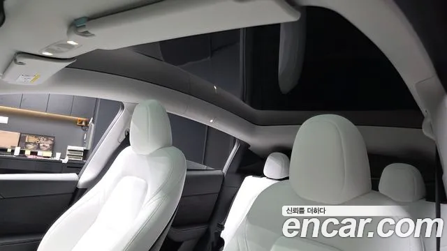 Tesla Model Y — Фото автомобиля 25