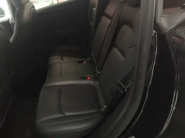 Tesla Model Y — Фото автомобиля 16