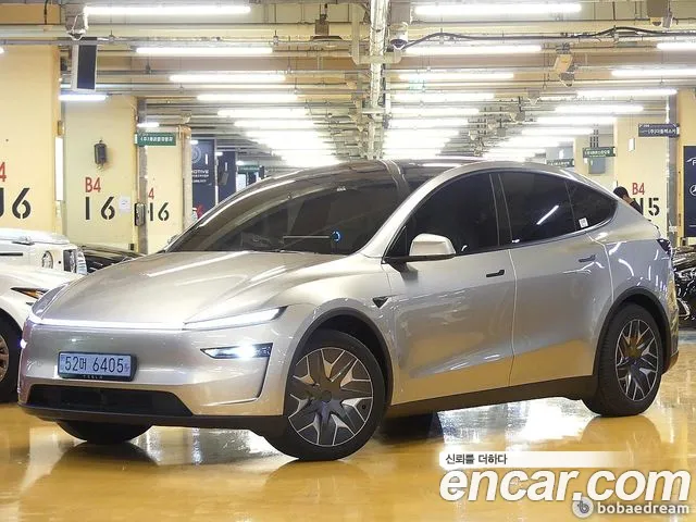 Tesla Model Y — Фото автомобиля 2