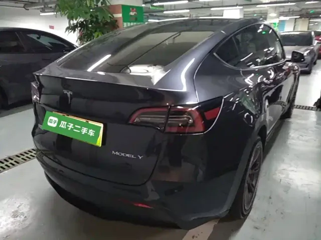 Tesla Model Y — Фото автомобиля 6