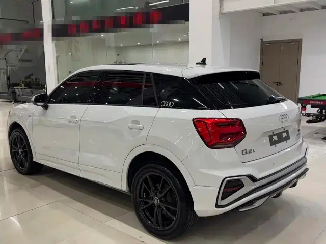 Audi Q2L — Фото автомобиля 6