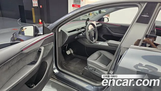 Tesla Model Y — Фото автомобиля 10