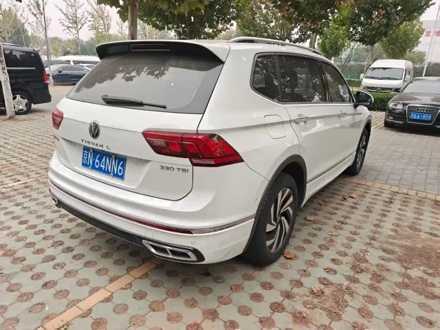 Volkswagen Tiguan L — Фото автомобиля 10