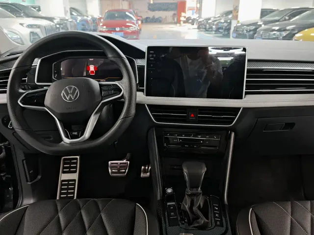 Volkswagen Tiguan L — Фото автомобиля 6