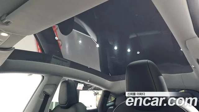 Tesla Model Y — Фото автомобиля 28
