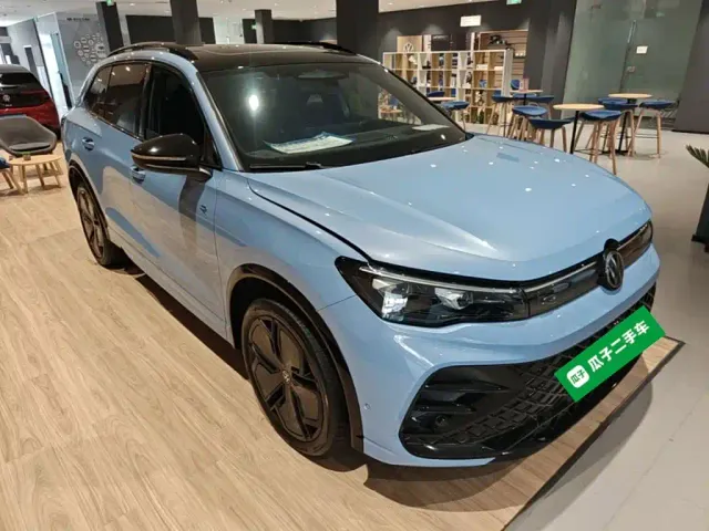 Volkswagen Tiguan L — Фото автомобиля 3