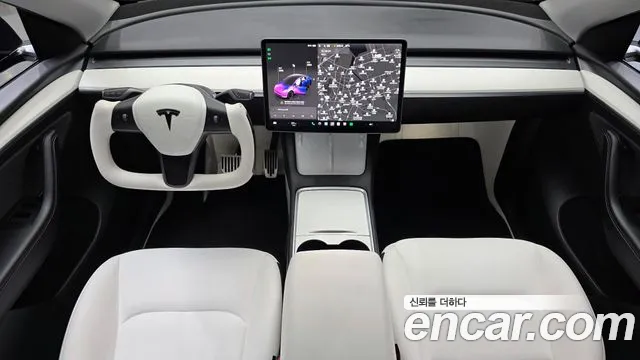 Tesla Model Y — Фото автомобиля 10