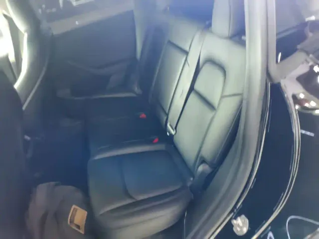 Tesla Model Y — Фото автомобиля 12
